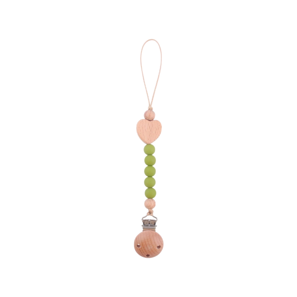 chupetero baby heart verde Chupetero de silicona con figura de corazon de madera beige